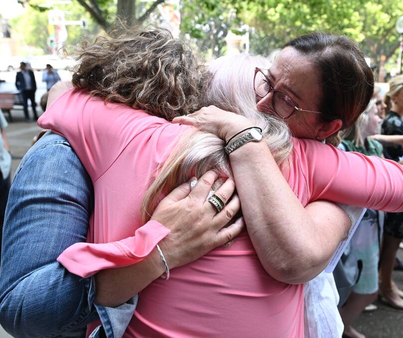Emotions: Women are overcome with emotion after winning a landmark pelvic mesh case against Johnson & Johnson.
