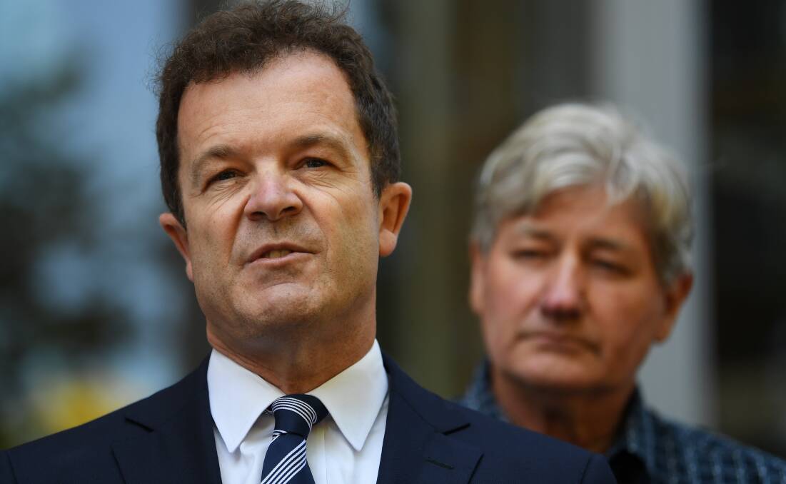 Laws: NSW Attorney-General Mark Speakman with Hunter child sex abuse survivor Paul Gray.