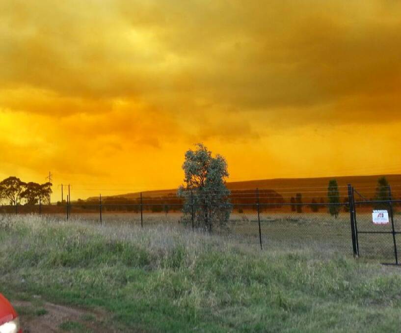 Pollution: An orange sky near the Mount Arthur coal mine outside Muswellbrook in 2014. Mount Arthur owner BHP was prosecuted for the toxic fumes from a blast gone wrong.
