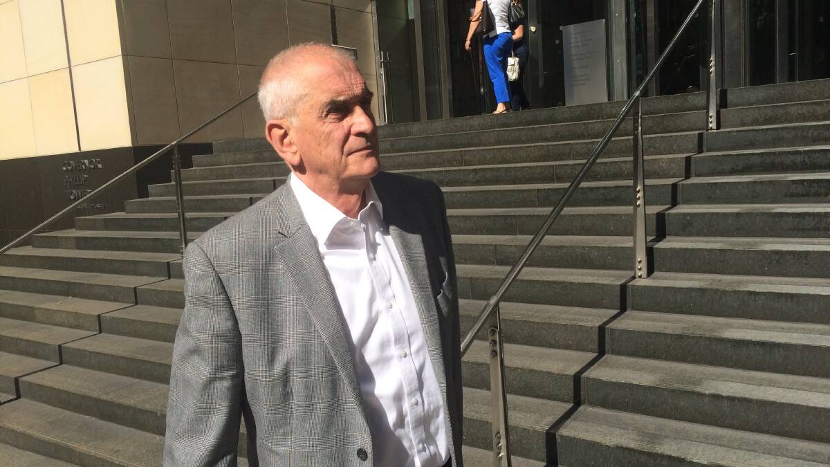 Charged: Former Newcastle Anglican Dean Graeme Lawrence pictured after giving evidence at the Royal Commission into Institutional Responses to Child Sexual Abuse. 