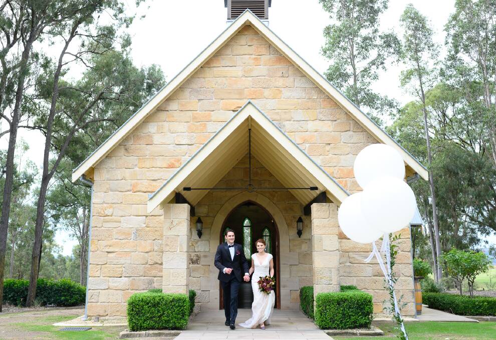 Talk: A couple after their wedding at The Vintage at Pokolbin. It is helping couples negotiate postponed and reduced weddings, and refunding deposits. Picture: Supplied. 