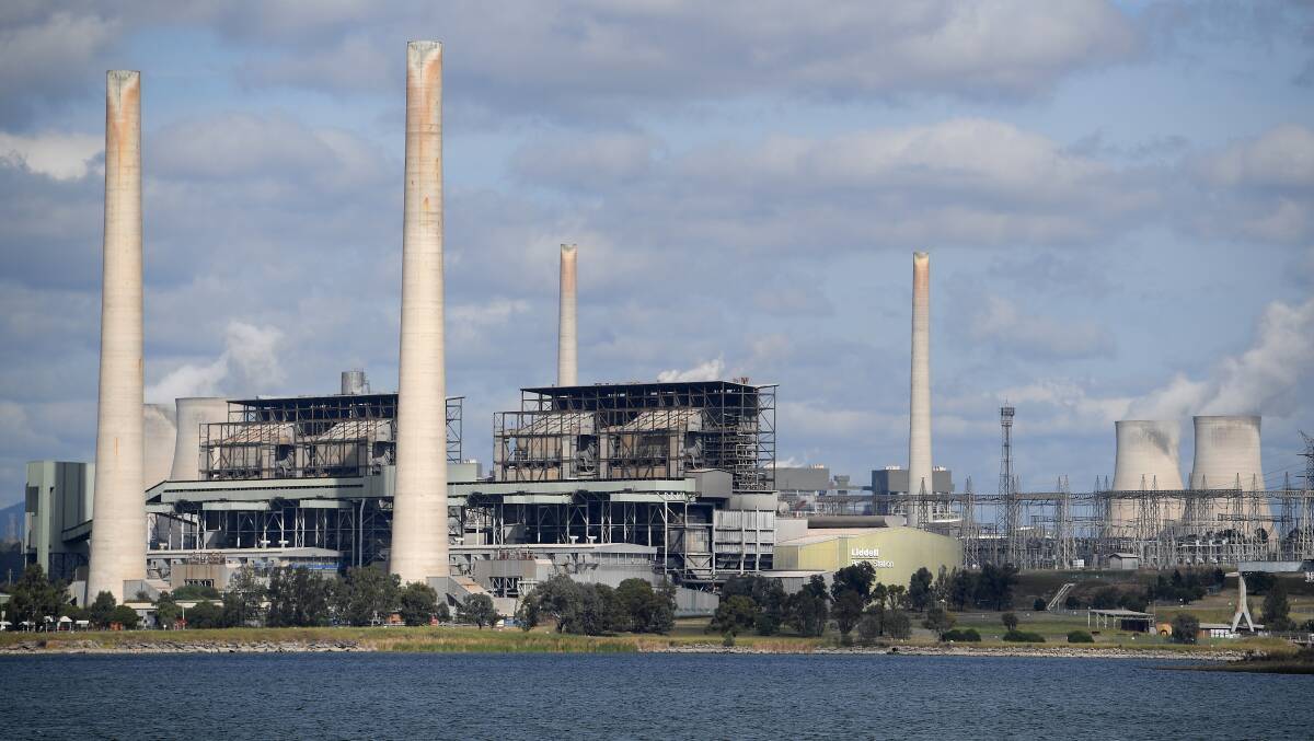 Closure: AGL's Liddell power station near Muswellbrook with the stacks of Bayswater in the background. Liddell is scheduled to close in 2022 and Bayswater in 2035.