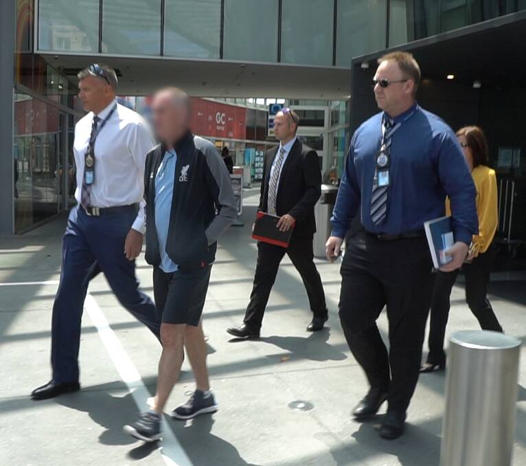 Arrest: Police in Queensland after arresting Warren McCorriston on Wednesday. Picture: NSW Police.