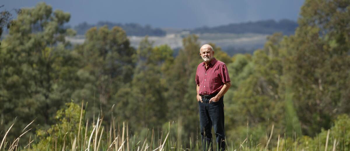 Damning: Bulga resident John Krey with Mount Thorley Warkworth coal mine in the background. New pollution figures show pollution control measures aren't working, he said.