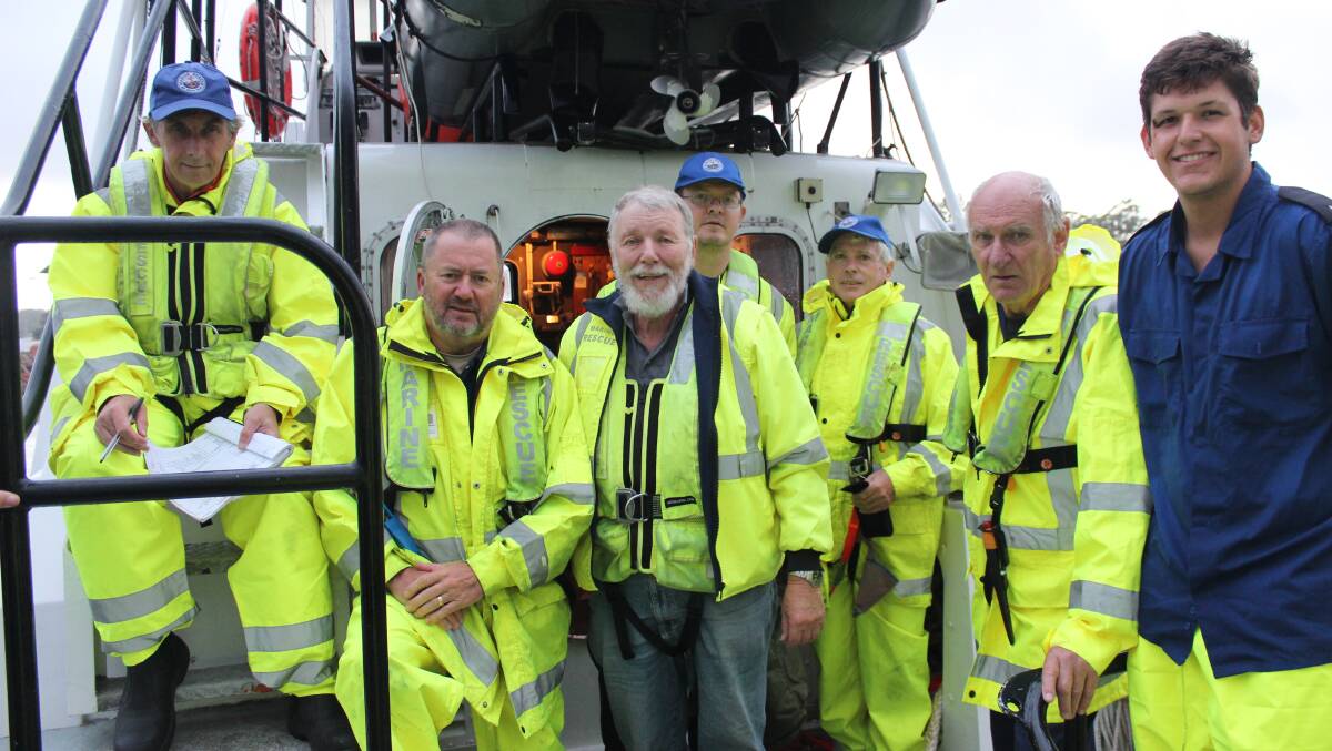 The Marine Rescue crew who were battered during an early morning rescue attempt in treacherous conditions in January 2016. Picture: Supplied