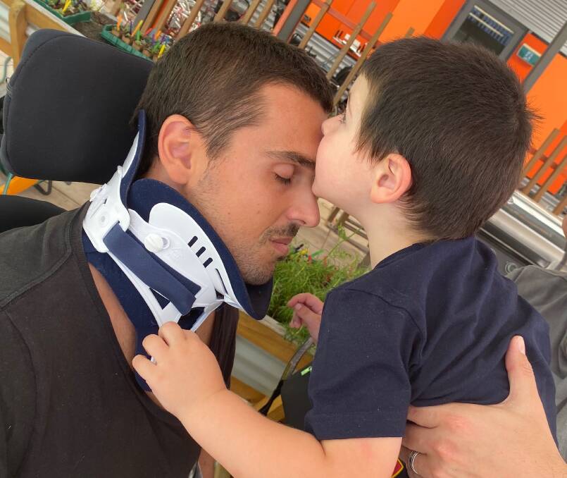 JOURNEY AHEAD: Chirs Poulos, of Belmont North, with his son Hunter at Royal North Shore Hospital. Picture: Supplied