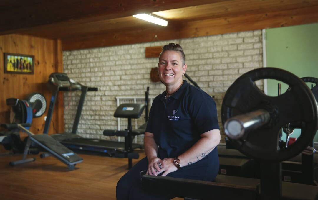 POWERFUL: Rachel Kerrigan at the powerlifting gym she has created inside her home at Wallsend. Picture: Marina Neil 