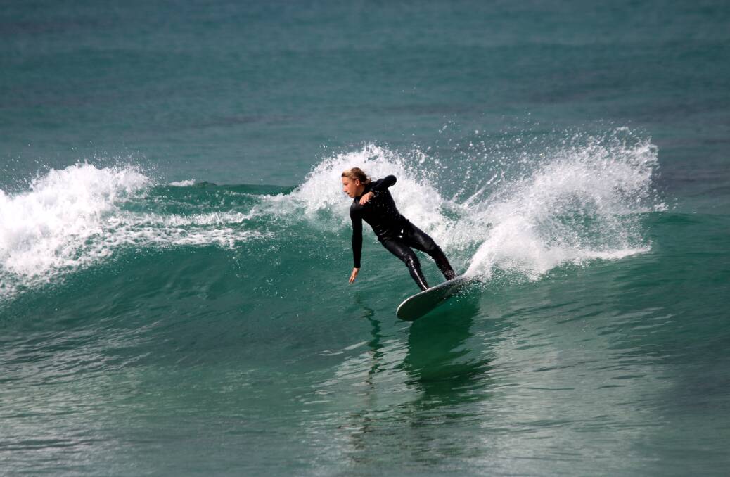 GLIDE: Surfer at Pogos on Sunday. Picture: Dave Anderson