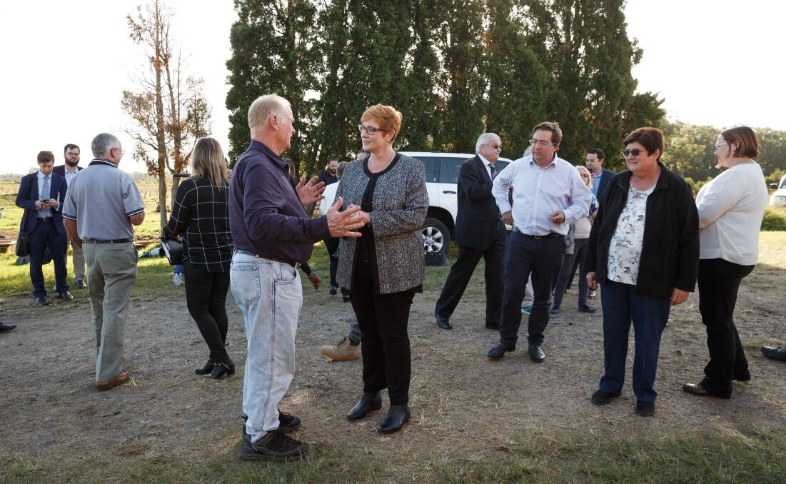 ON SITE: Former Defence Minister Marise Payne meeting Len O'Connell on his property in Salt Ash. Picture: Max Mason-Hubers MMH