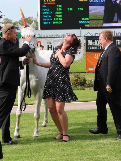 THE PENNY DROPS: Sean Langley proposes to Jona Taylor at Newcastle Racecourses Derby Day. 