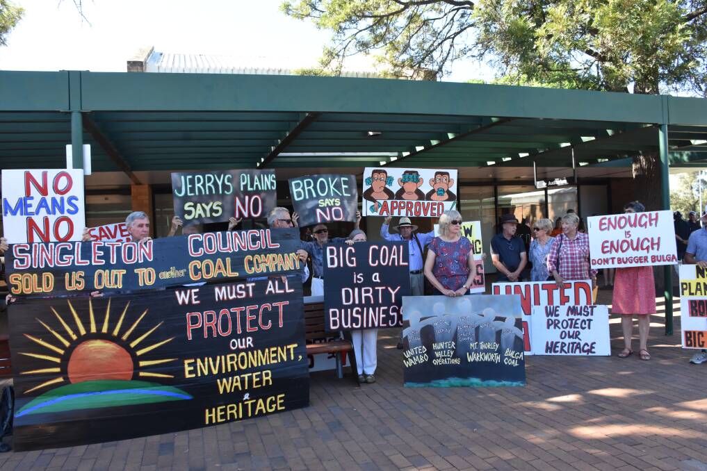 OPPOSITION: Protesters outside the most recent Independent Planning Commission meeting in Singleton. Picture: The Singleton Argus
