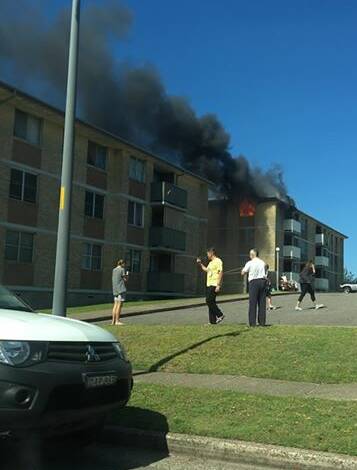 DAMAGE: A contributed photo of the fire in a third-floor apartment in Merewether on October 29. 