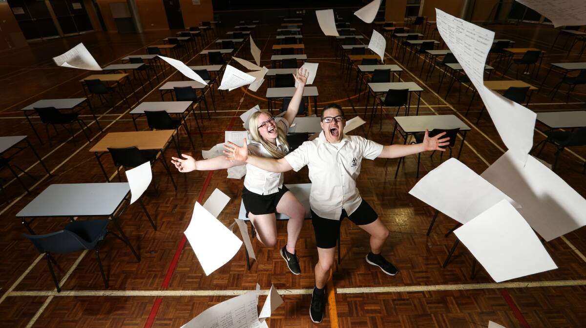 APPLAUSE: Callaghan College students Abigail Black and Michael Leggett were some of the the last to finish this year's HSC. Picture: Marina Neil  