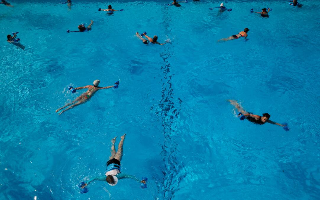 MAKING A SPLASH: An aqua aerobics class at Lambton Pool. The pool is hosting an Aquathon for charity on Saturday morning. Picture: Max Max-Hubers. 