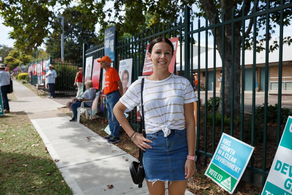 DECISION TIME: Amy Carroll of Charlestown stops for a photo after voting at Charlestown Public School. Picture: Max Mason-Hubers 
