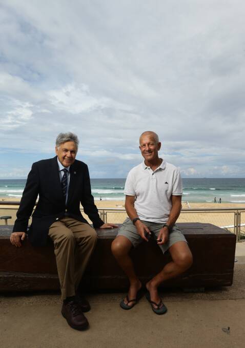ALL IN A NAME: Emil and Robert Dan at Merewether Beach. Picture: Jonathan Carroll