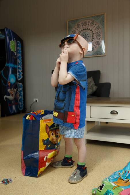 SURPRISE: Sam Hope at Ronald McDonald House with his showbag. Picture: Max Mason-Hubers