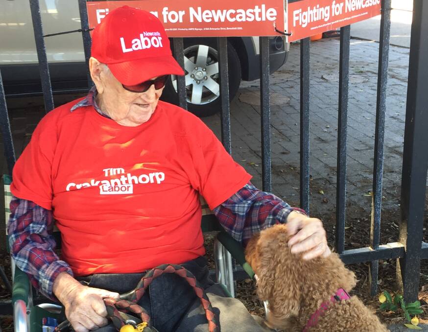 DOG MINDER: Donald Roser has been handing out how-to-votes in Carrington for forty years. Picture: Phoebe Moloney
