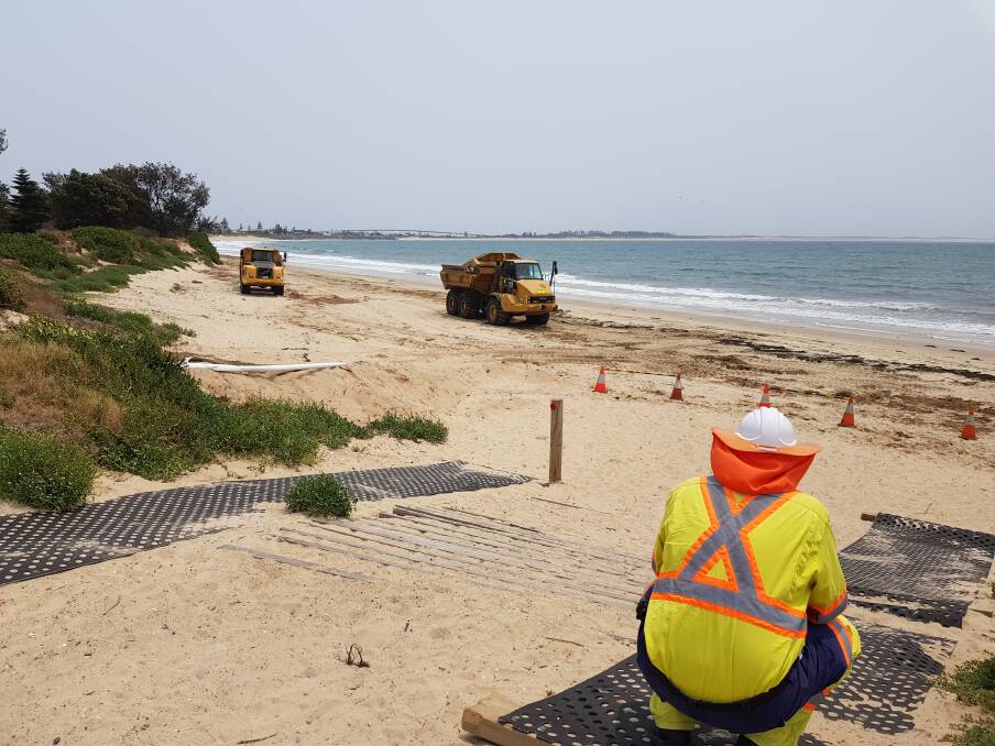 Pictures: Trucks began delivery sand to Stockton beach on Monday 