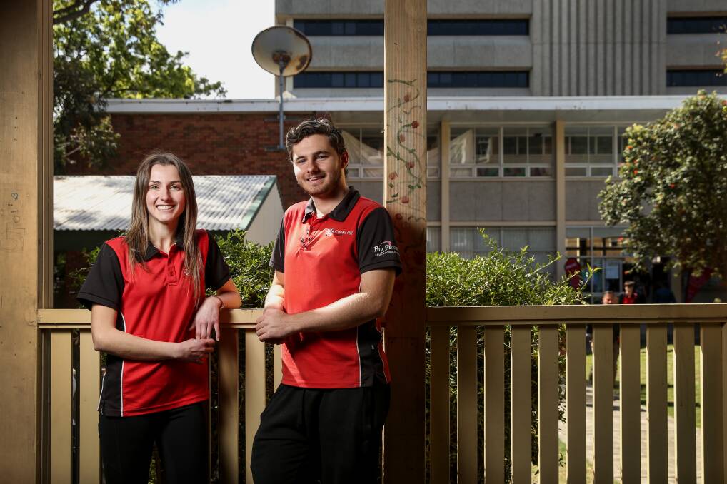 COMPLETE: Newcastle High School Cooks Hill Campus graduates Emily Hicks and Sam Norman. Picture: Marina Neil 