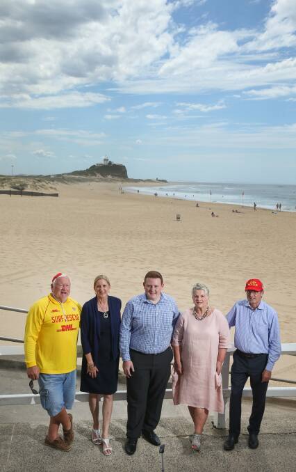 GIFT OF LIFE: Hunter Surf Life Saving president Henry Scruton, Liberal candidates Jenny Barrie and Blake Keating, Hunter Surf Life Saving CEO Rhonda Scruton and  Parliamentary Secretary for the Hunter Scot MacDonald at Nobbys Beach. Picture: Marine Neil