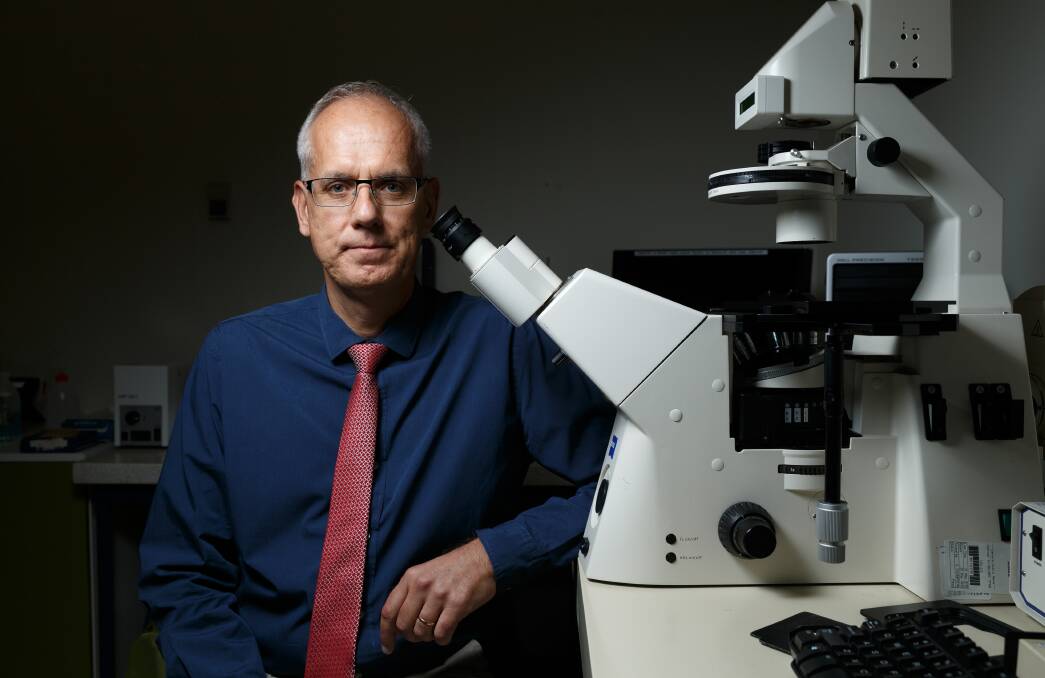 NEW APPROACH: Professor Hubert Hondermarck in his cancer neurobiology lab at the University of Newcastle's Callaghan campus. Picture: Max Mason-Hubers 