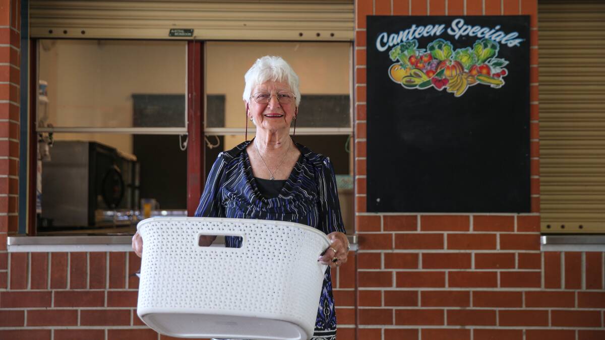 CANTEEN LADY: Elaine Roberts, 83, has volunteered at Wallsend Public School for almost 20 years after she first attended the school herself in 1946. Picture: Marina Neil