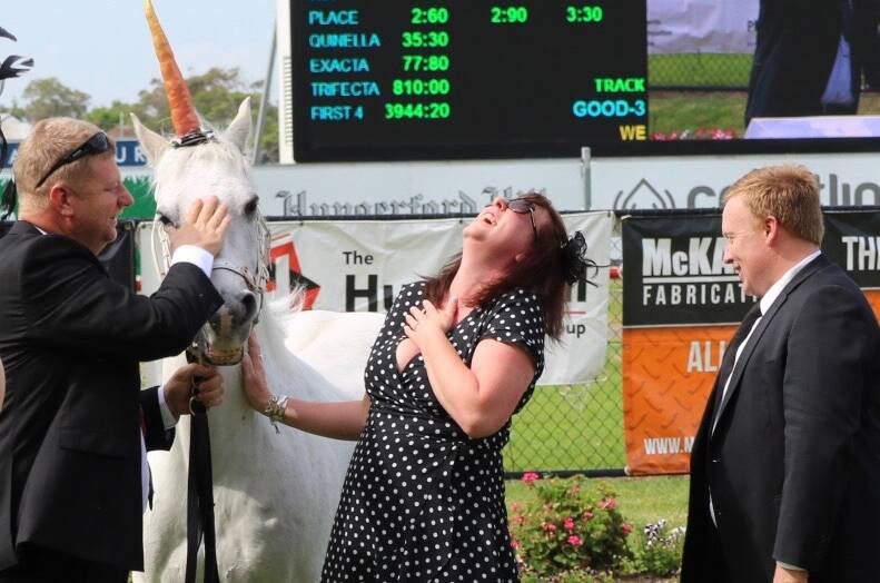 UNEXPECTED: Sean Langley popping the question to Jona Taylor on Saturday between race five and six of Derby Day at Newcastle Racecourse. 