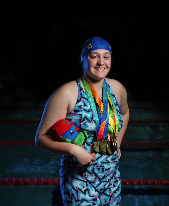 GOLD: Gabriella Howells, 16, with the medals she won at the International Sports Federation for Persons with Intellectual Disability Global Games. Picture: Marina Neil 