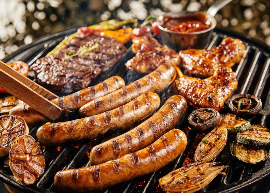 Delicious: What could be more mouth watering than some sausages, chicken wings, steak, onions and mushrooms. Photo: Shutterstock.