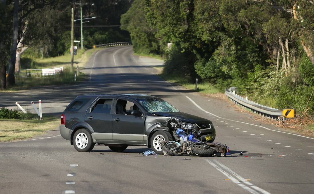 The scene at Cooranbong where a car and motorbike collided. Picture: Marina Neil