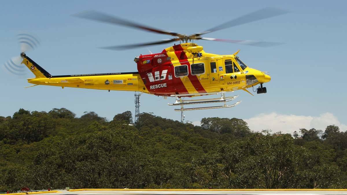Westpac rescue chopper lifts woman to safety following Hawks Nest rock accident