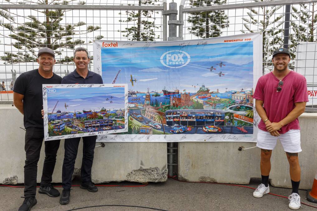 Luke Egan, Craig Lowndes, and artist Mitch Revs with his artwork. Picture: Edge Photographics