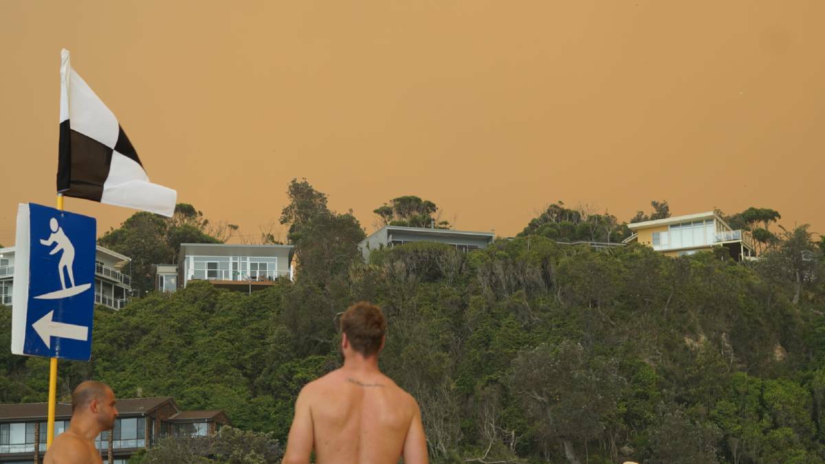 The sky changes colour at Mollymook and Ulladulla as burnt leaves start to fall on the beach. Picture: Supplied
