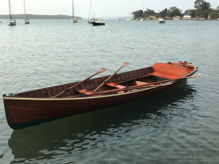 AFLOAT: The historic wooden boat on Lake Macquarie. Picture: Supplied