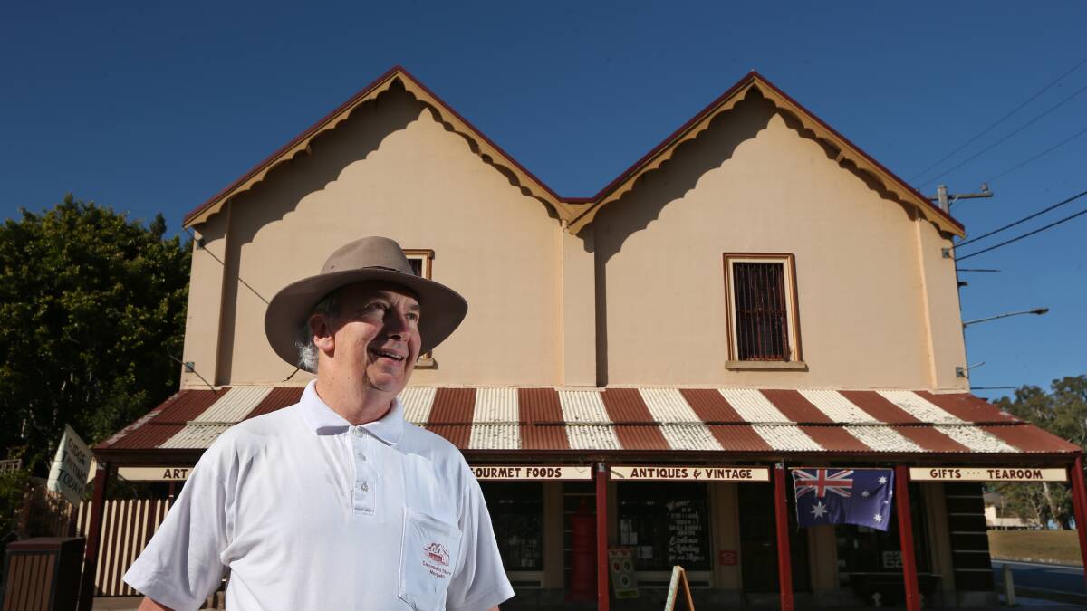 Trevor Richards outside Campbell's Store, a tourist drawcard in Morpeth