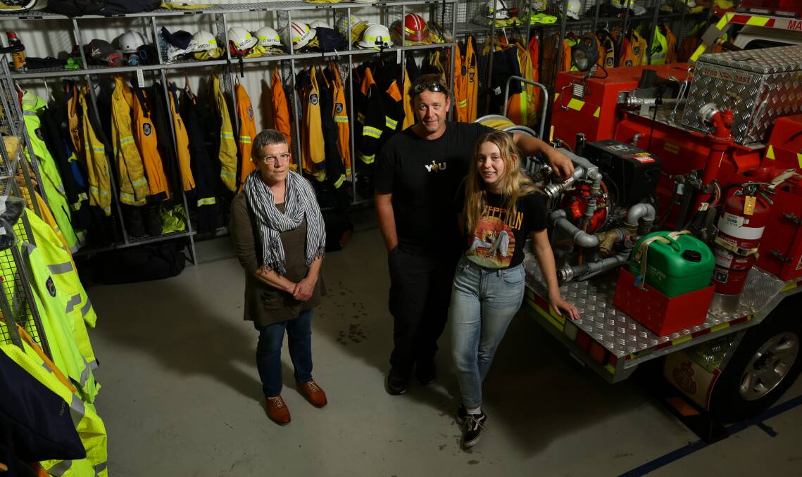 RECRUITS: Martinsville residents Pat Tierney, Steven Ward, and his 16-year-old daughter, Imogen Ward, have recently joined their local rural fire brigade. Picture: Jonathan Carroll 