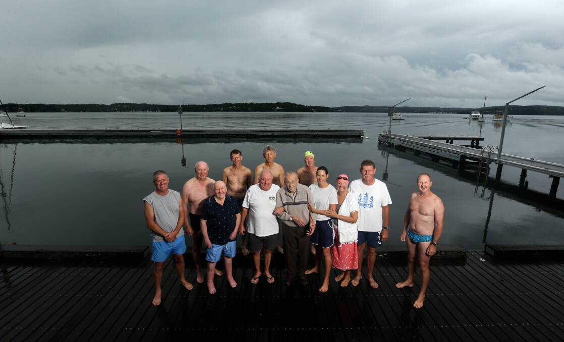 A group of morning swimmers, with 92-year-old Alan Pearson in the middle, at Toronto baths. Picture: Jonathan Carroll
