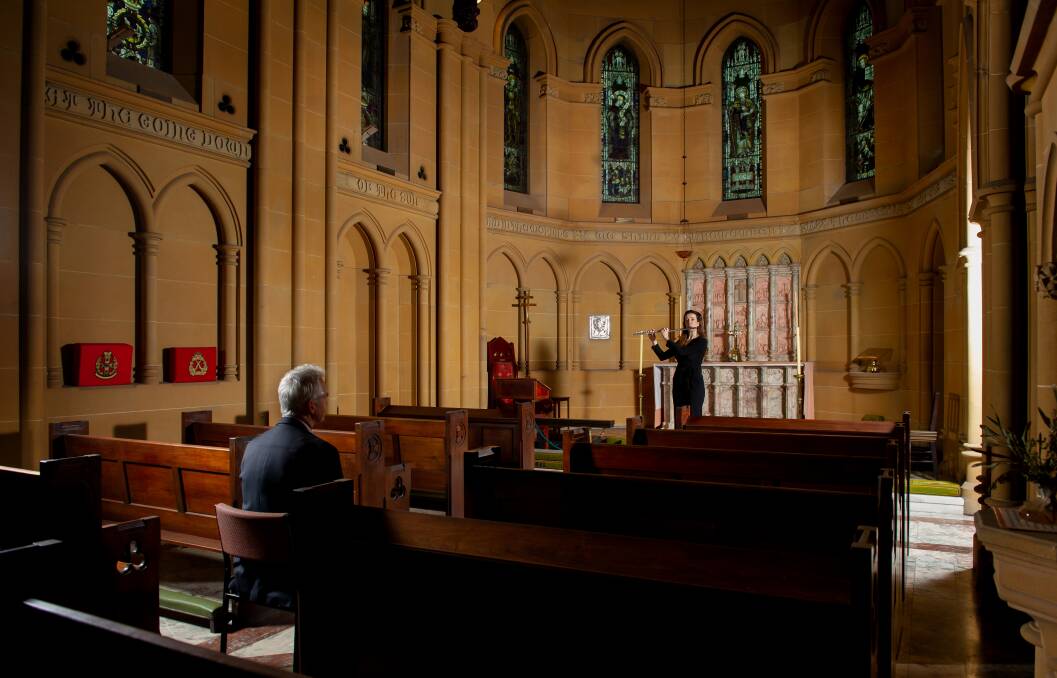 Flautist Sally Walker playing at a 1:1 Concert for listener Scott Bevan at Christ Church Cathedral. Picture: Marina Neil