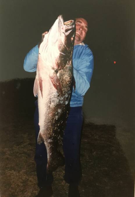 BIG CATCH: Author Don Wilson with a 73lb mulloway he caught at Birubi Point. 