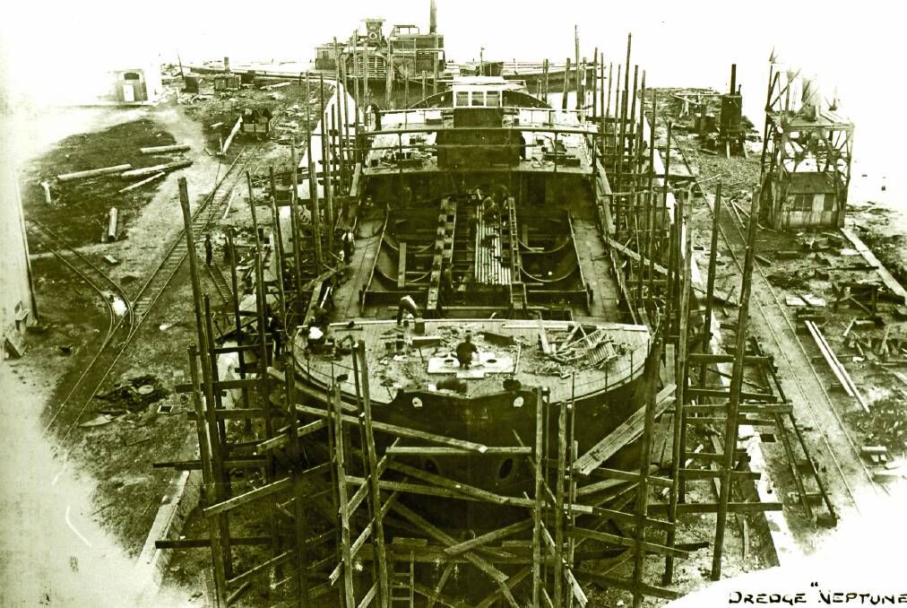 The dredge "Neptune" being built at the Walsh Island Dockyard in 1923. Picture: Courtesy, Special Collections, University of Newcastle 