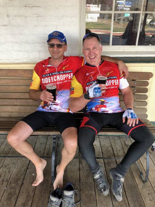 MATES: Daniel Camilleri and Danny Egan taking a break while participating in Ride for the Chopper. 