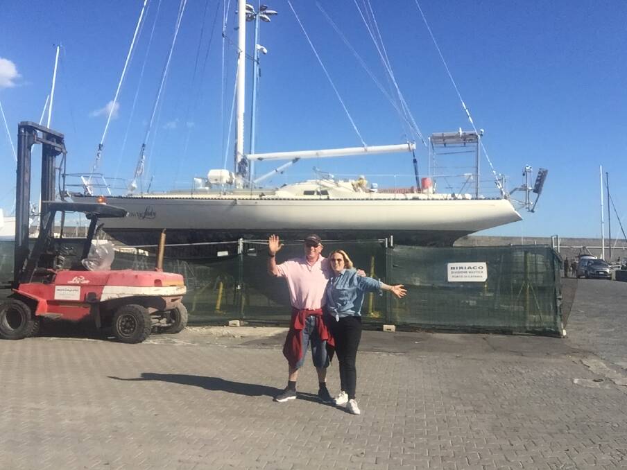 FAMILY TIES: Tony Mowbray and his daughter Holly with their beloved yacht - renamed Bowtie Lady - at a boatyard in Sicily last month. 