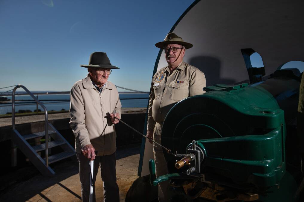 
Veteran David Needham pulls the lanyard to fire the historic gun at Fort Scratchley. Picture: Marina Neil
