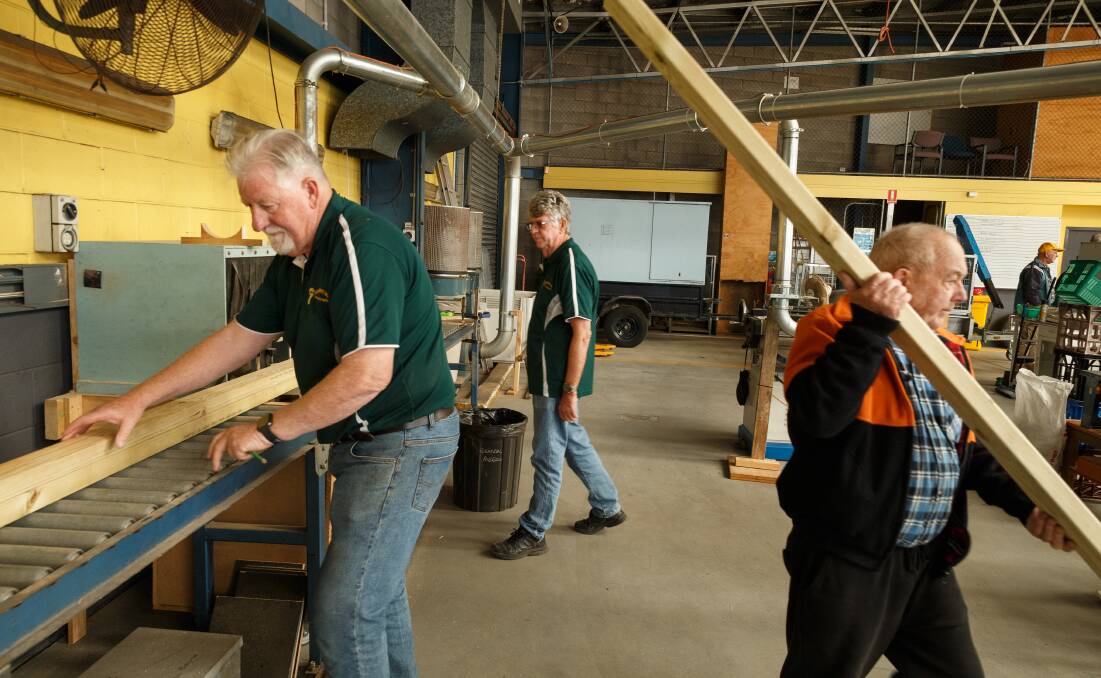 Newcastle Men's Shed members at work. Picture: Max Mason-Hubers