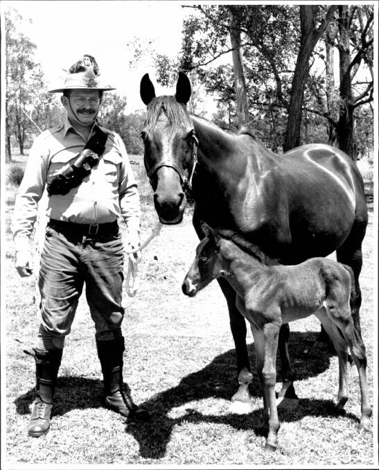 RECREATING HISTORY: David Dial, wearing an Australian Light Horse uniform, and with his steed, who he called Mirth, and her foal in the 1980s. 