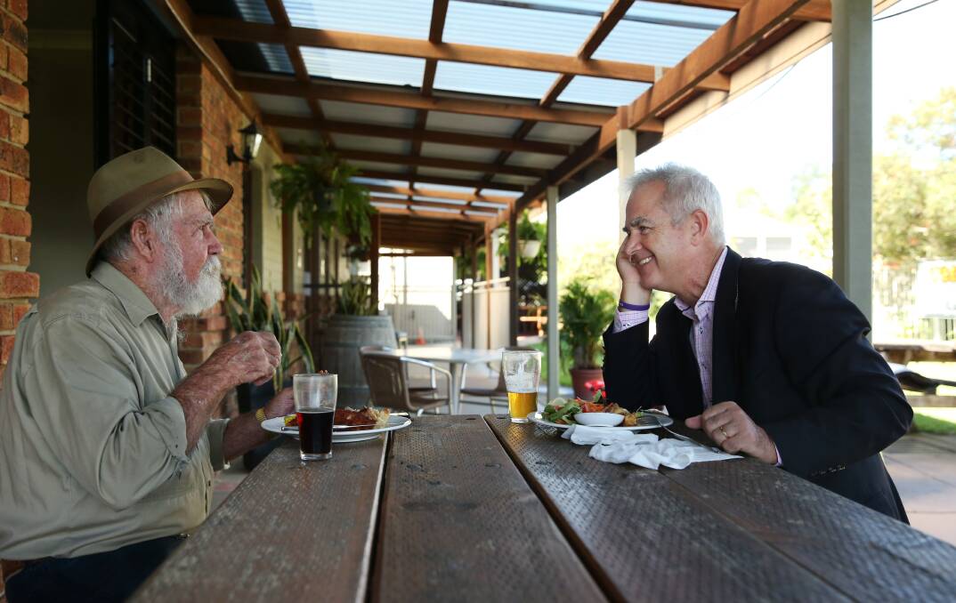 TELLING YARNS: Bush orator Bob Skelton, aka "The Minmi Magster", at lunch with Scott Bevan. Pictures: Simone De Peak