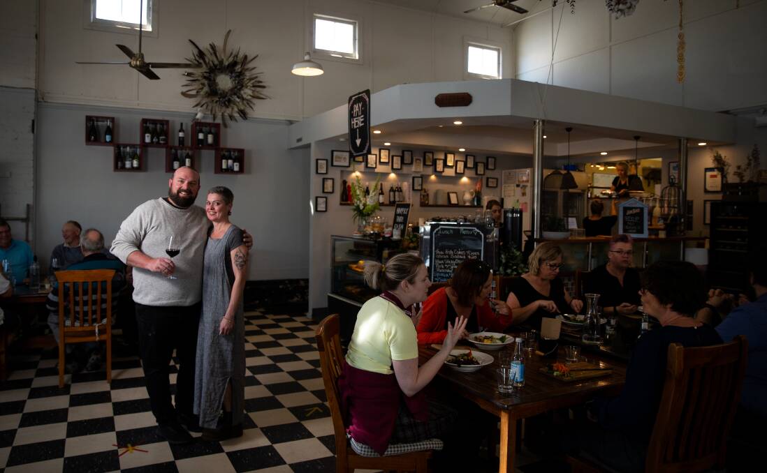 TOAST TO TRACK: Stella Bistro owners Craig Stephenson and Stephanie "Stevie" Parker in their Dowling Street business. Picture: Marina Neil