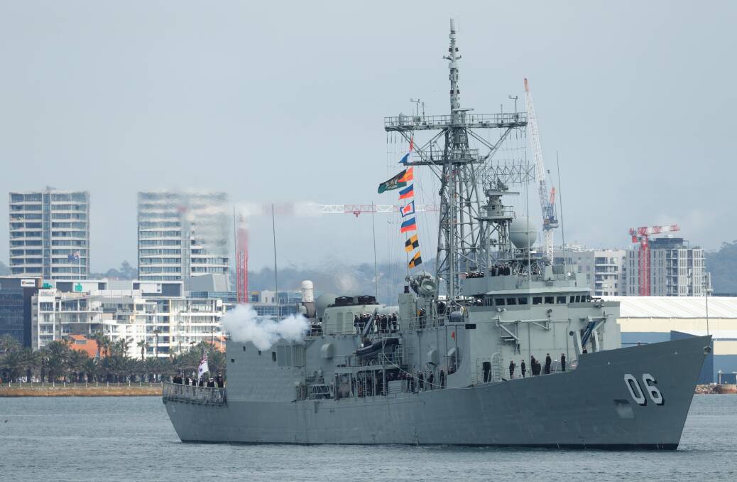 HMAS Newcastle departing the port of its namesake city for the final time. Picture: Max Mason-Hubers