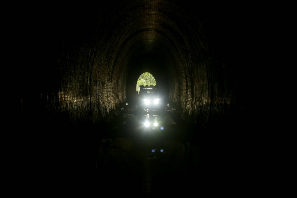 Headlights indicate a four-wheel-drive vehicle is approaching through No.2 Tunnel. Picture: Jonathan Carroll